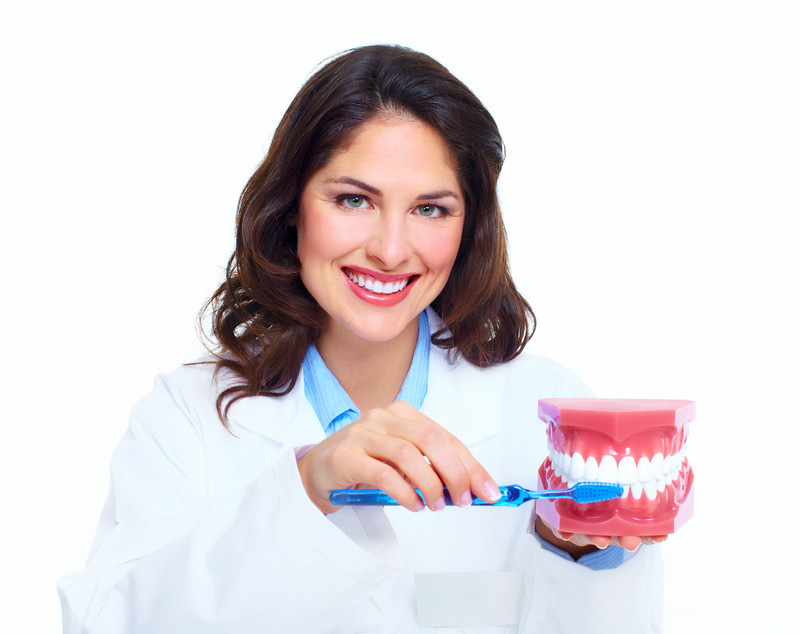 dentist-woman-toothbrush-teeth-model-canstockphoto13239206