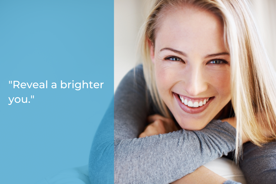A smiling woman with blonde hair leans forward, resting her arms on a surface. Text on a blue background reads, "Reveal a brighter you.