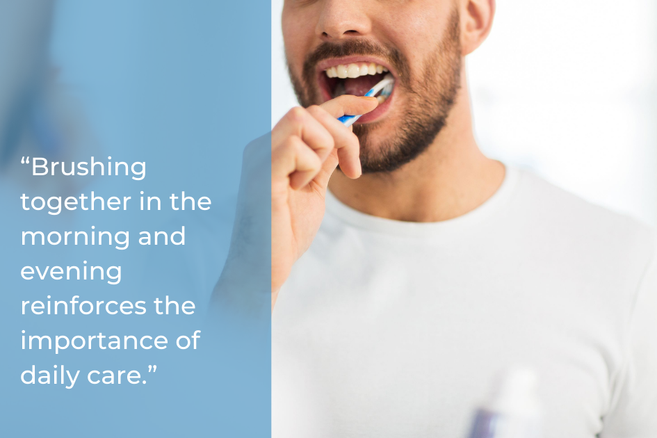A man brushes his teeth with a blue toothbrush next to a motivational quote about the importance of daily oral health routines for year-round wellness.